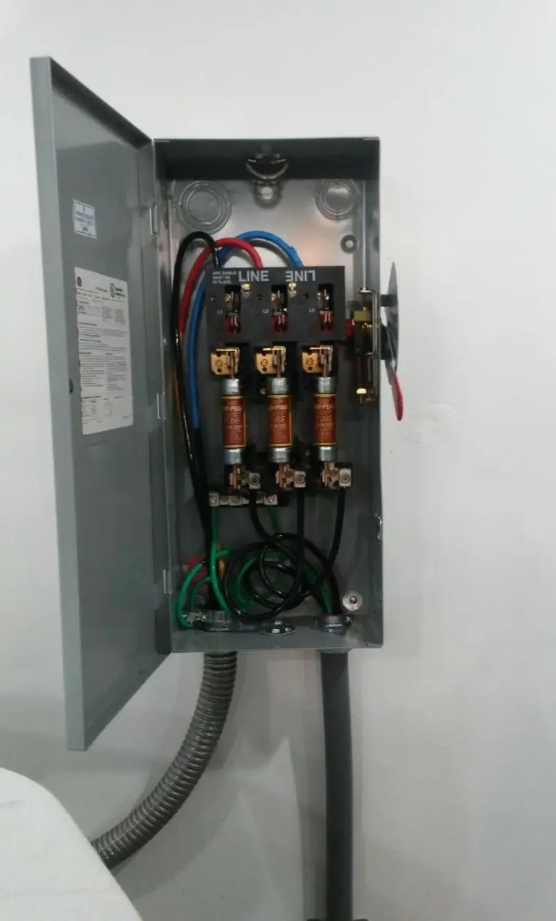 Three-phase disconnect switch installed for Smoke Detector Installation in Gladwin