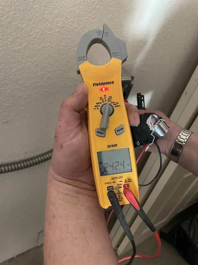 Voltage testing with clamp meter during Generator Installation in Gladwin